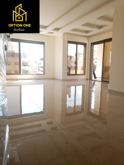 3 Bedroom Flat for Sale in Khalda, Amman - شقة طابق ثالث مع رووف في خلدا للبيع مساحة 200م + رووف 40م