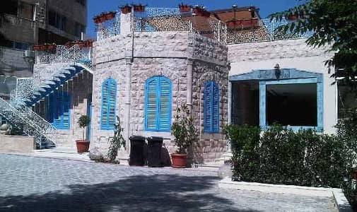 مجمع تجاري للبيع في جبل عمان، عمان - Photo مجمع تجاري للبيع في جبل عمان، عمان - Photo