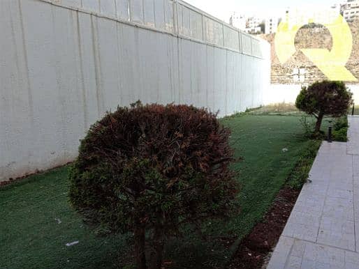 Semi-ground floor apartment and garden for rent in Abdun | 447 SQM