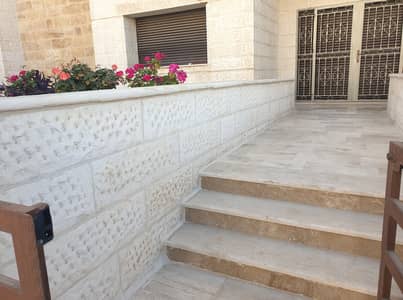 3 Bedroom Flat for Sale in Gardens, Amman - Ground floor apartment for sale with a small terrace in Gardens Street