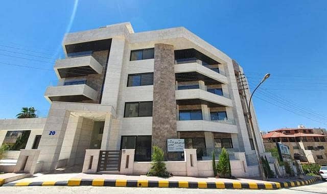 شقة طابق ارضي للبيع في اجمل احياء الشميساني بالقرب من جميع الخدمات