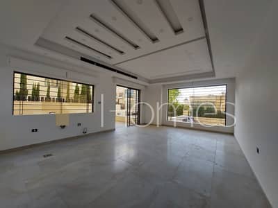 فلیٹ 2 غرفة نوم للبيع في عبدون، عمان - شقة ارضية مع ترس حديثة قيد التشطيب للبيع في عبدون، مساحة بناء 90 م