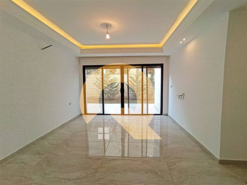 b2 apartment (Semi-ground apartment) for sale in the most beautiful areas of Abdoun 220 m new (did not live) with a garden with super deluxe finishes