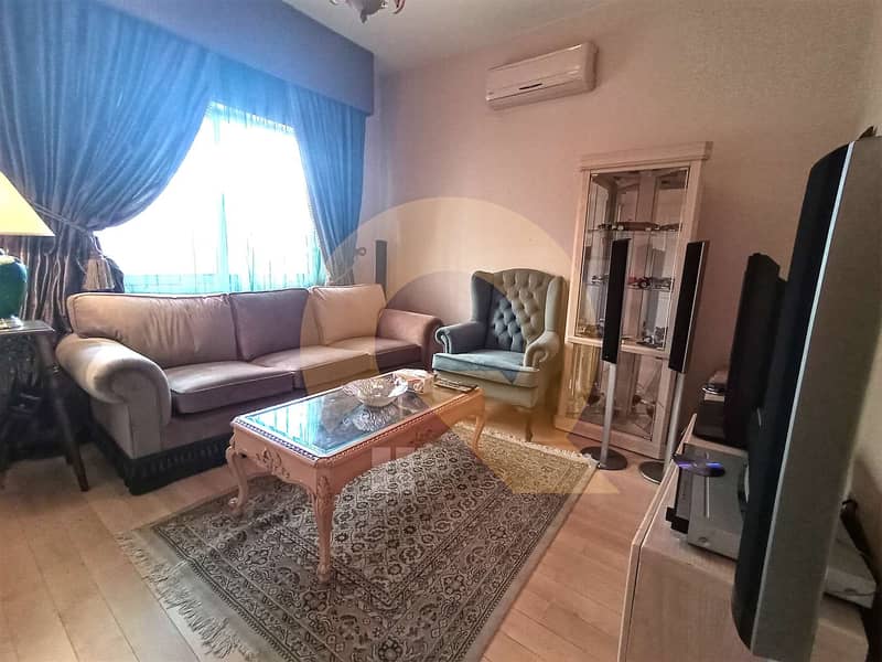 A luxurious furnished ground floor apartment for rent in the most beautiful areas of Deir Ghbar, an area of ​​120 meters, with a garden of 200 meters