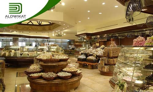 عقارات تجارية اخرى  للبيع في شارع مكة، عمان - مطعم للبيع على دوار مكة مساحة البناء 110 م مساحة الترس 30 م