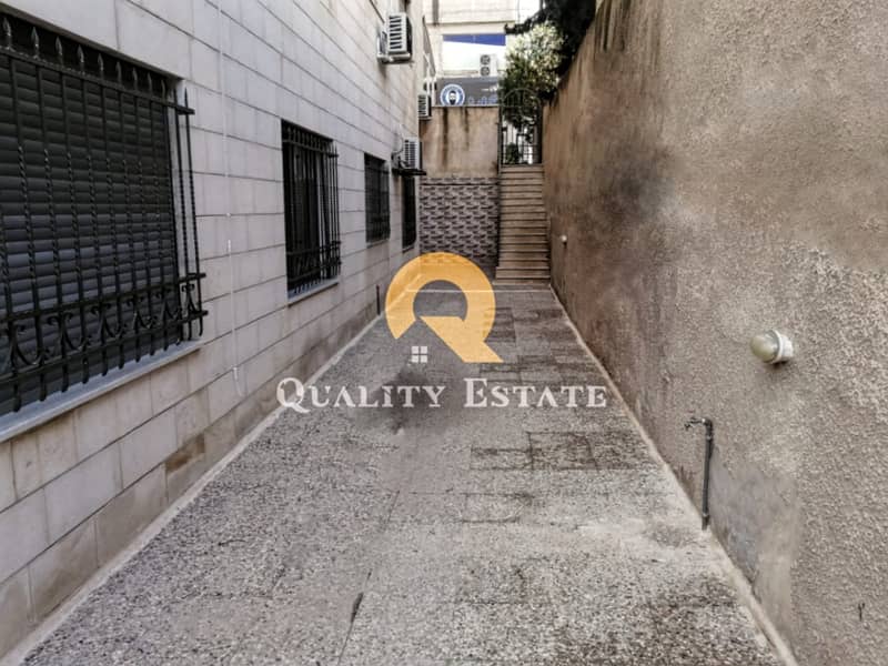 A semi-ground apartment for rent in the most beautiful areas of Al-Weibdeh, an area of ​​190 square meters, with a garden near the Paris roundabout