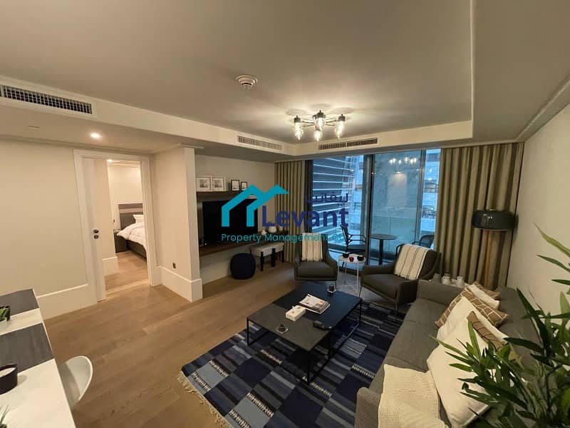 Modern Balcony Apartment with Communal Roof Pool in Al Abdali 3058