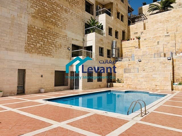 Large Balcony Apartment with Communal Pool in Jabal Amman 3077