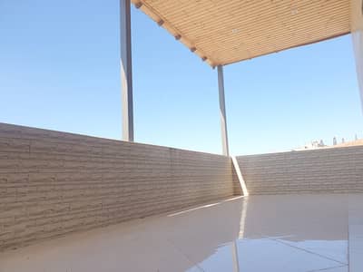 فلیٹ 2 غرفة نوم للايجار في الرابية، عمان - رووف مطل للايجار فارغ 200 متر جديد في الرابية