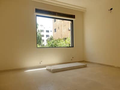 3 Bedroom Flat for Sale in 7th Circle, Amman - شقة ارضية مع حديقة جديدة للبيع محيط سيفوي السابع