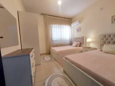 3 Bedroom Flat for Rent in Rabyeh, Amman - الرابية شقة ارضية مميزة مفروشة للإيجار مع حديقة
