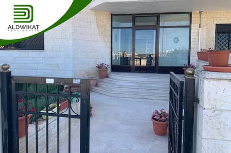 3 Bedroom Flat for Rent in Khalda, Amman - شقة طابقية للايجار في خلدا طابق ارضي مساحة البناء 400 م مساحة الحديقة 150 م
