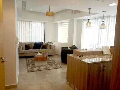 1 Bedroom Flat for Sale in Al Abdali, Amman - للبيع شقة 1 نوم استثمارية في بوليفارد العبدلي