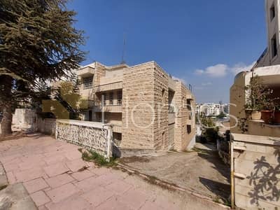 2 Bedroom Residential Building for Sale in Abdun, Amman - Photo