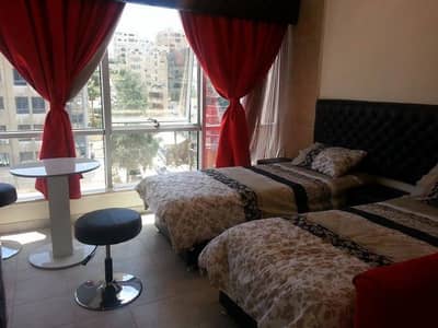 1 Bedroom Apartment for Rent in Gardens, Amman - Photo